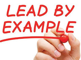 hand writing "lead by example"