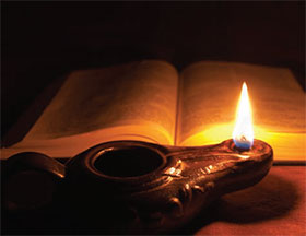 lamp in front of Bible