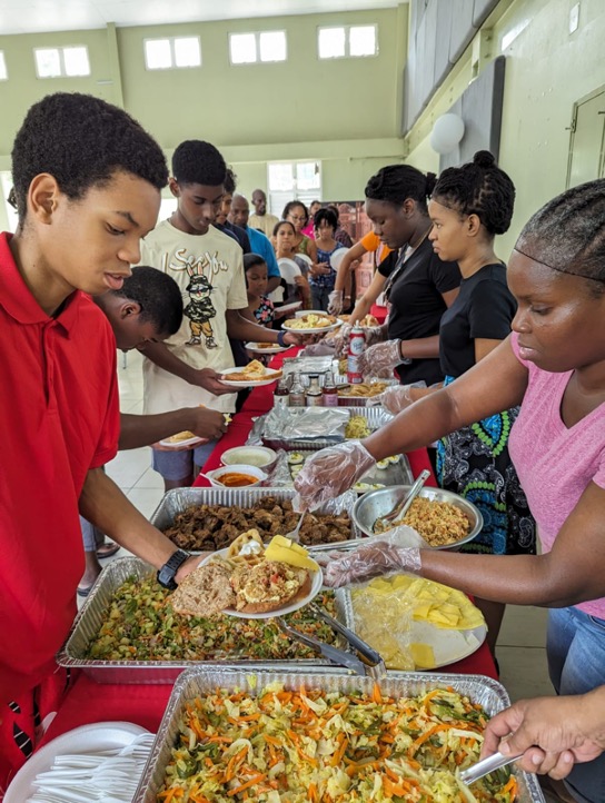 Trinidad brethren enjoying a tasty meal