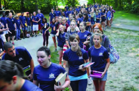 campers on the way to the meeting hall