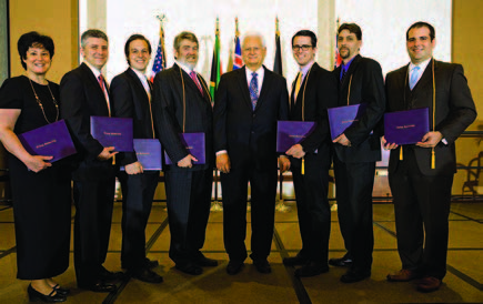 LU students holding diplomas