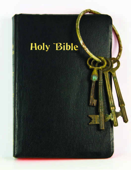 keys hanging on a Bible